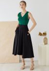 Falda midi evasé con textura gofrada en negro