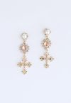 Aretes colgantes con cristales cruzados y perlas decoradas