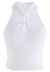 Top corto de punto con cuello halter y nudo en blanco