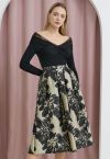 Llamativa falda midi plisada de jacquard floral