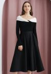 Elegante falda midi plisada de corte A con bolsillos laterales en negro