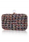 Clutch de tweed con flecos de colores nobles