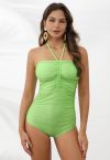 Traje de baño con cuello halter y cordón de color liso en verde