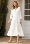 Vestido maxi bohemio con bordado de crochet y botones en blanco