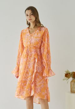 Vestido midi plisado con volantes florales en naranja