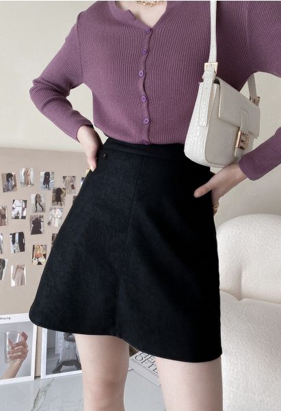 Minifalda Bud de piel sintética texturizada en negro
