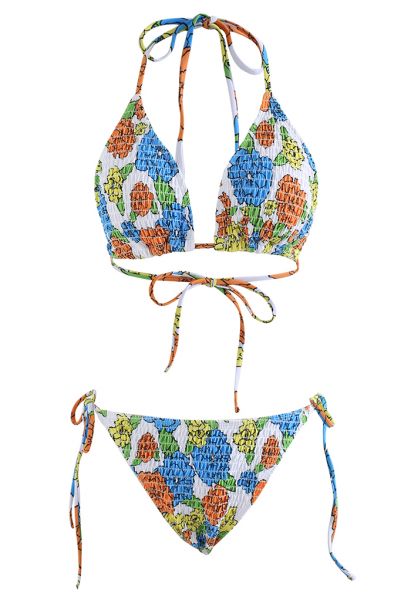 Conjunto de bikini con frunces de flores de colores