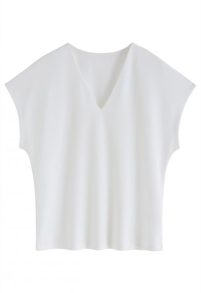 Camiseta de algodón con cuello de pico en blanco