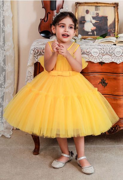 Vestido de tul con cintura con lazo en amarillo para niños