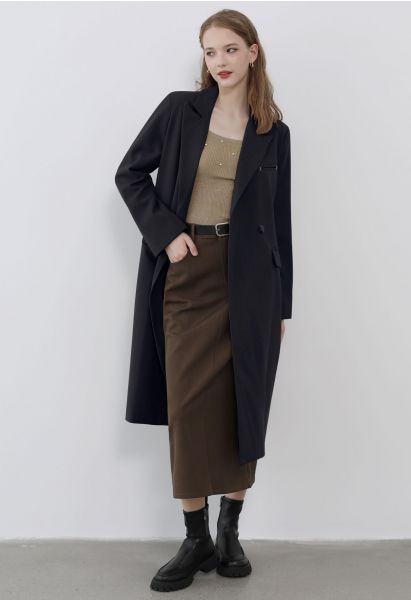Abrigo largo con cinturón y doble botonadura de moda en negro