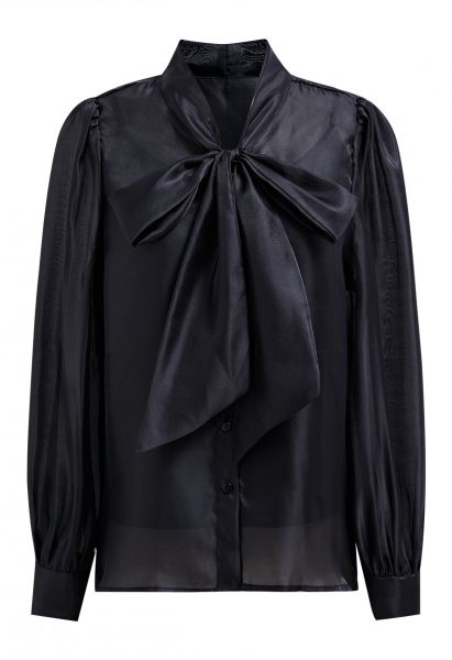 Camisa transparente elegante con mangas abullonadas y lazo en negro