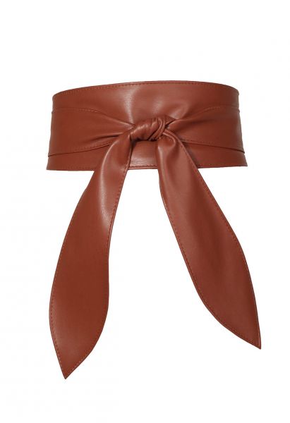 Cinturón tipo corsé con nudo anudado de piel sintética en color caramelo