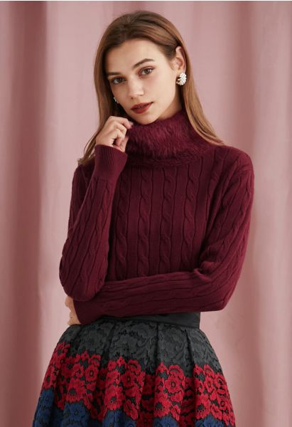 Suéter de punto de ochos con cuello alto y suave en color burdeos