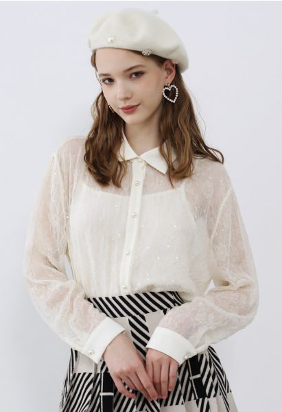 Camisa con botones de lentejuelas y malla floral en color crema