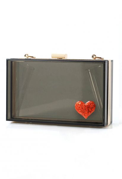 Bolso de mano con perlas translúcidas y corazón rojo en negro