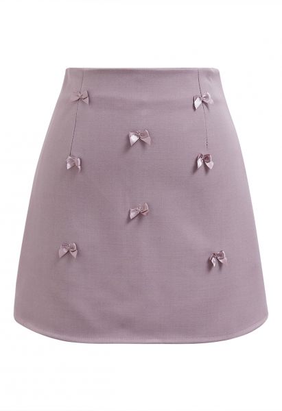 Minifalda adornada con lazos en color malva