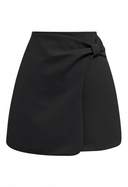 Minifalda elegante con solapa y lazo en negro