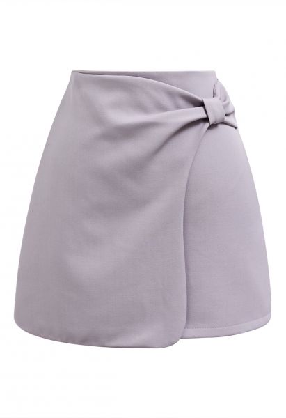 Minifalda elegante con solapa y lazo en color lila