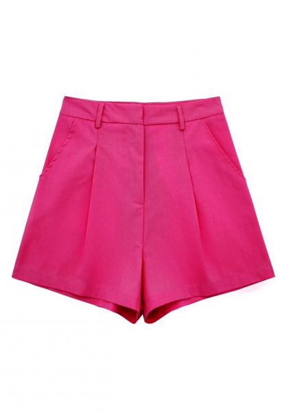 Pantalones cortos plisados en mezcla de lino con bolsillo lateral en rosa fuerte