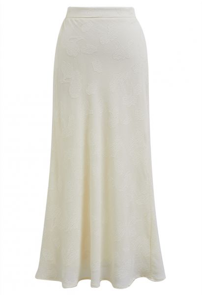Falda larga con textura floral en relieve en color crema