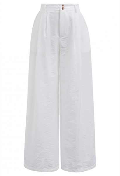 Pantalones anchos con detalle de pinzas en blanco
