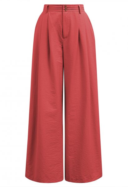 Pantalones anchos con detalle de pinzas en rojo