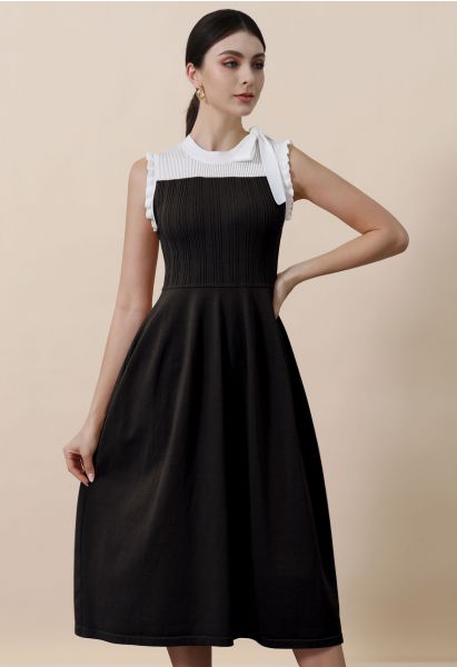 Vestido midi de punto sin mangas con volantes en los hombros y lazo en negro