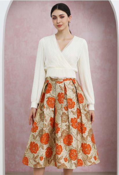 Falda midi plisada con vuelo y estampado floral en jacquard en color naranja