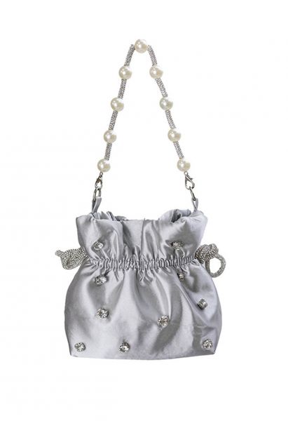 Bolso de hombro con cordón y decoración de diamantes de imitación en color gris