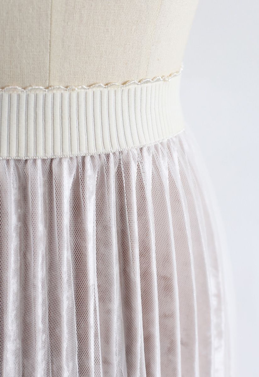 Falda asimétrica de terciopelo con dobladillo de encaje en blanco