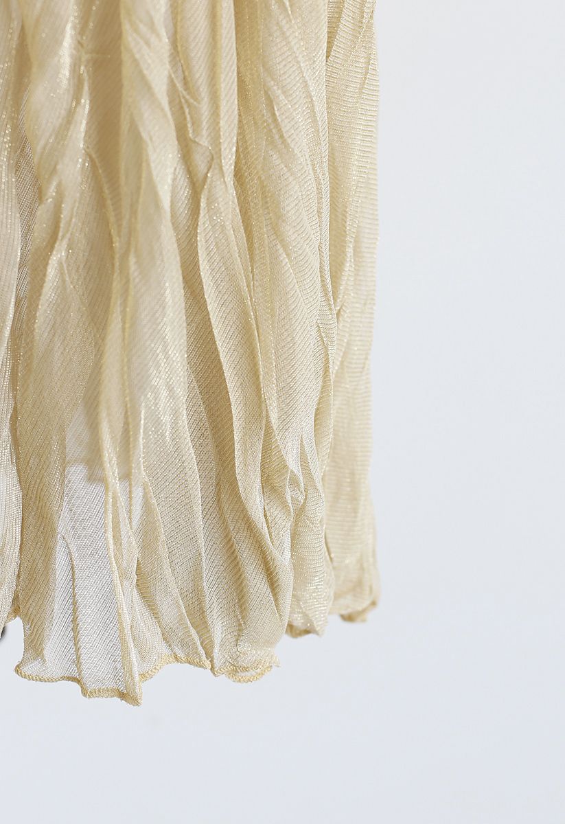 Falda plisada de malla brillante semitransparente en amarillo