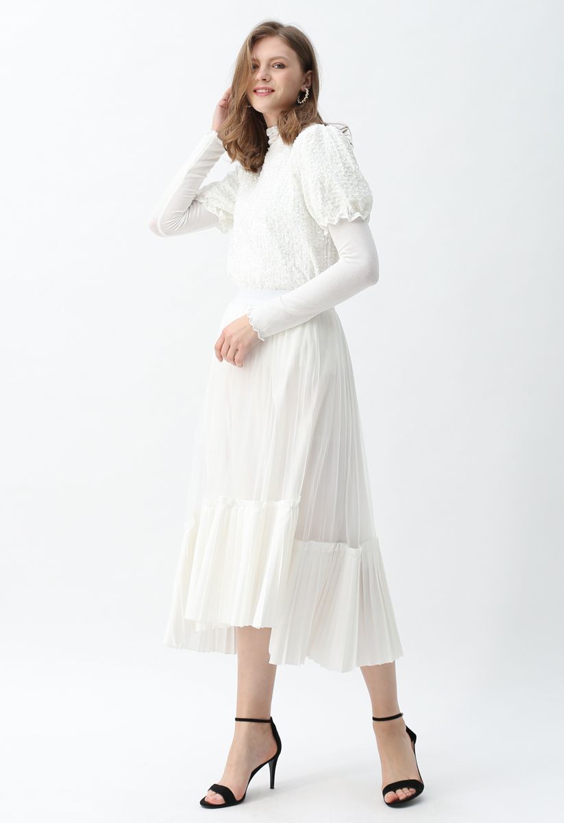 Falda midi plisada con dobladillo asimétrico de malla en blanco