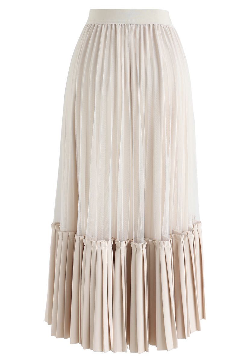 Falda midi plisada con dobladillo asimétrico de malla en color crema