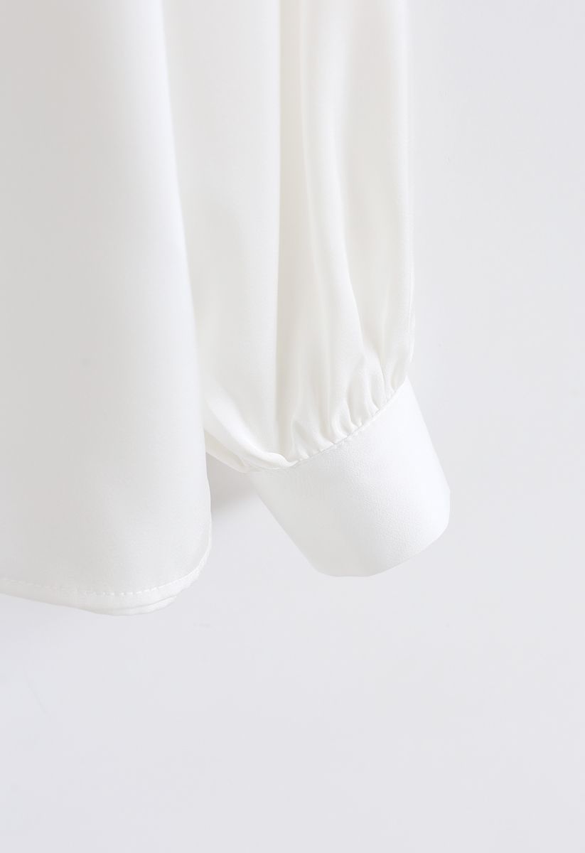 Top de chifón de encaje adornado con perlas en blanco