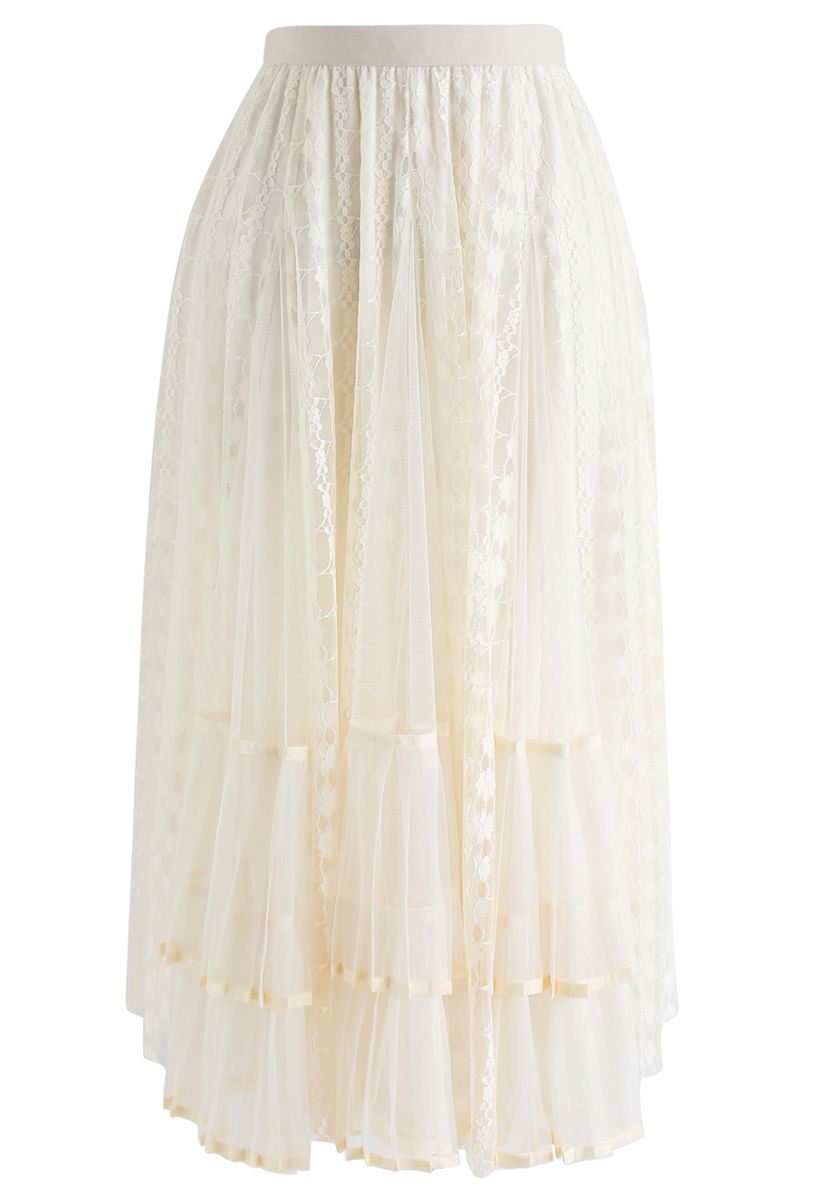 Falda asimétrica de malla plisada de encaje en color crema
