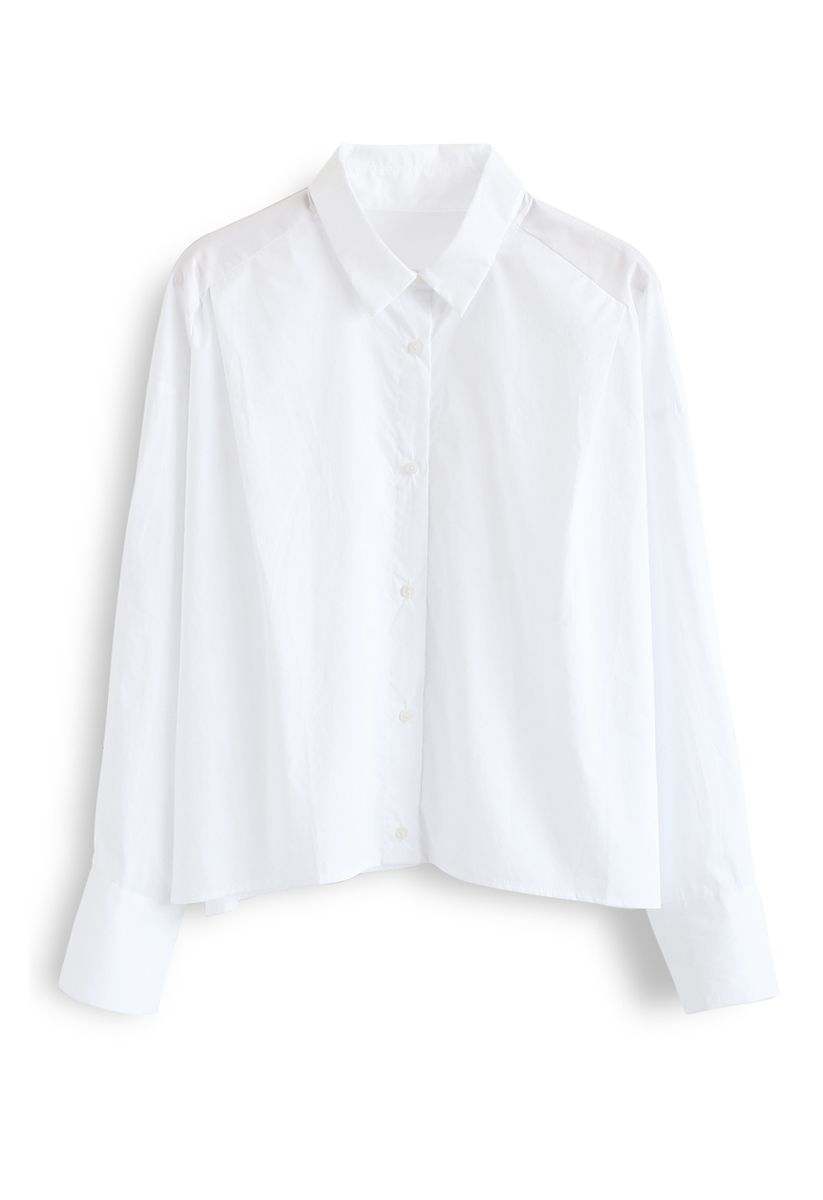 Camisa corta con mangas abotonadas en blanco