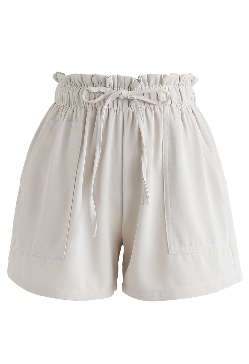 Pantalones cortos con bolsillos en la cintura PaperBag en crema