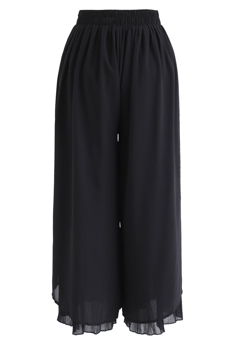 Pantalones cortos de gasa con dobladillo plisado dividido en negro
