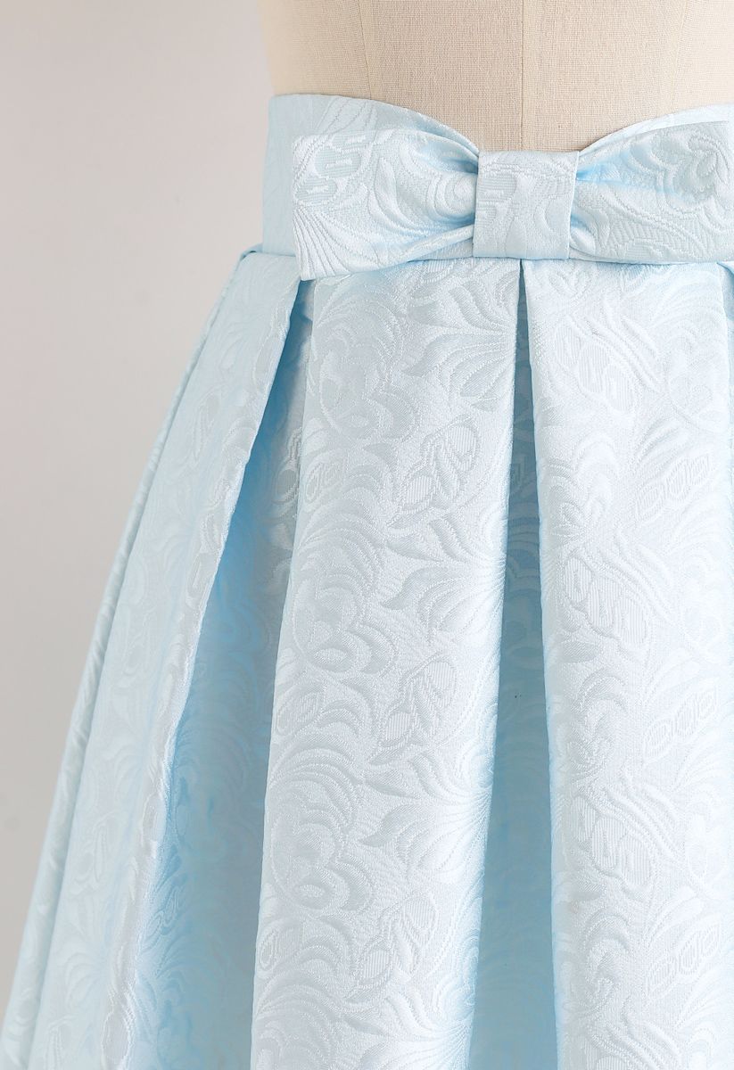 Falda midi de jacquard plisada con lazo en azul bebé
