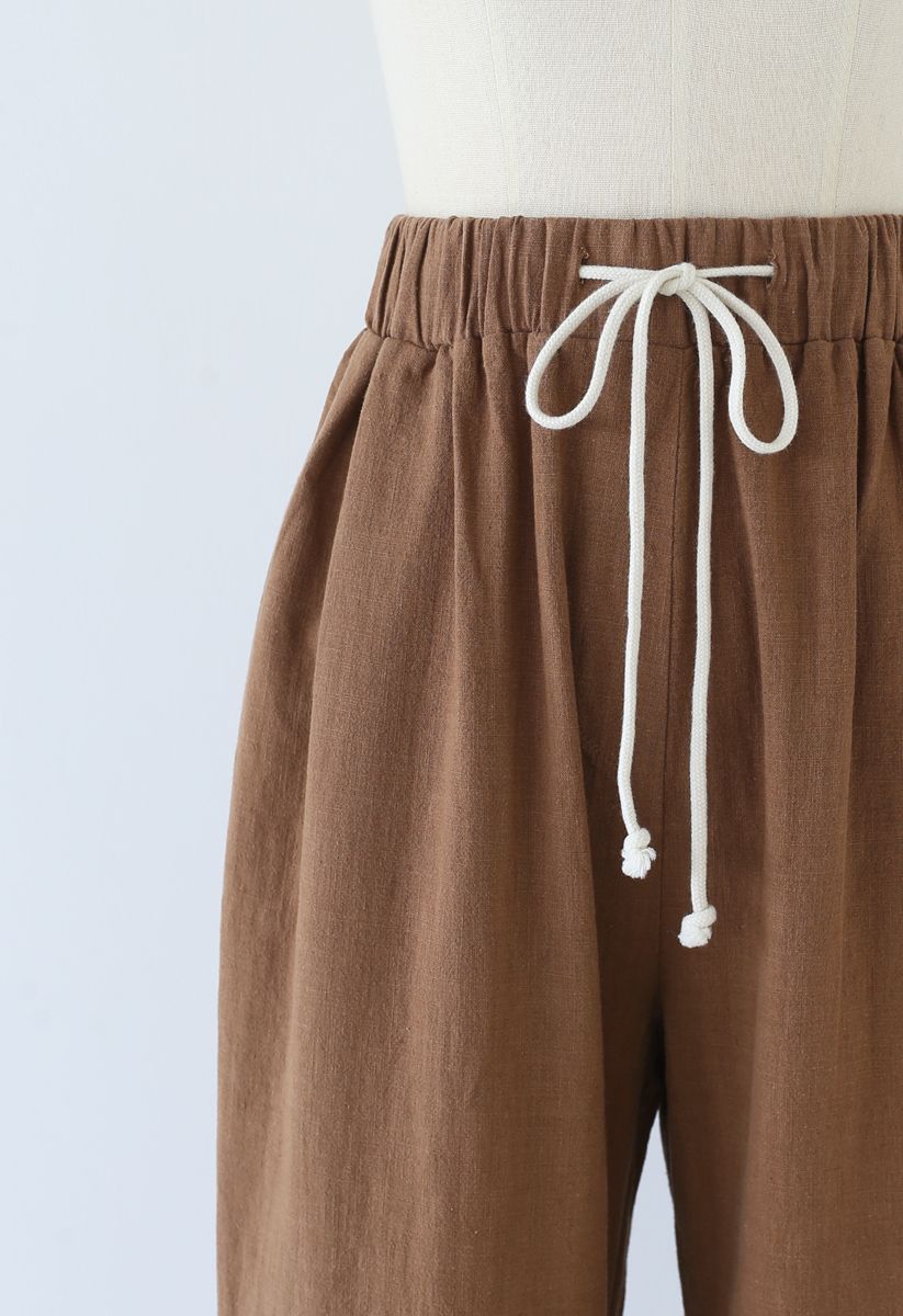 Pantalones de pernera ancha con cordón en la cintura en caramelo
