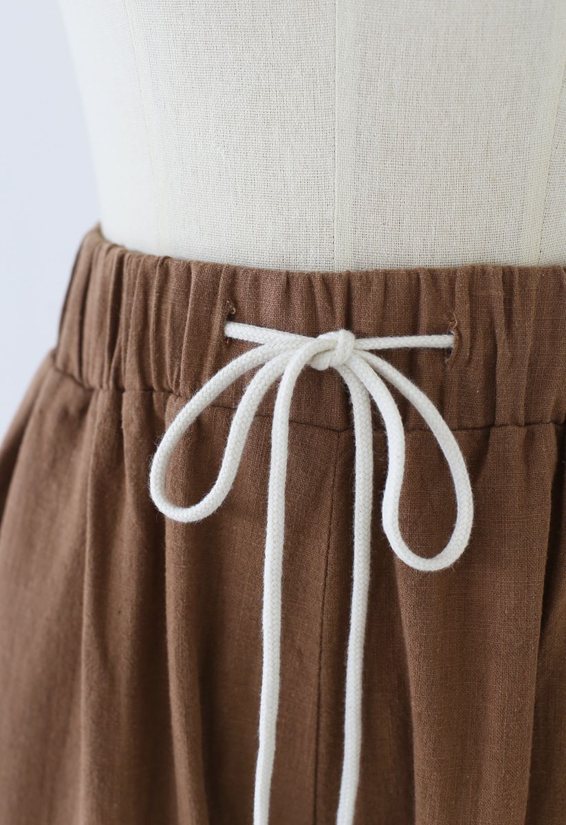 Pantalones de pernera ancha con cordón en la cintura en caramelo