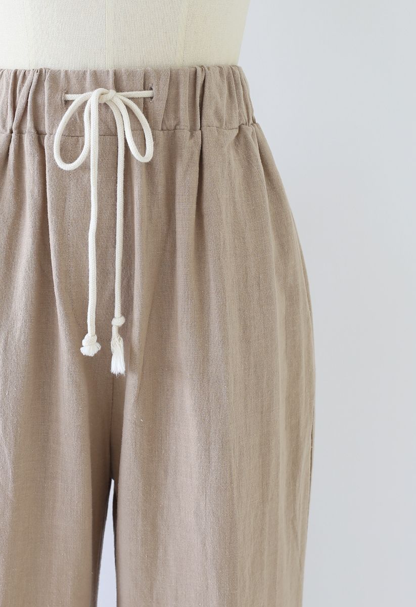 Pantalones anchos con cordón en la cintura en lino