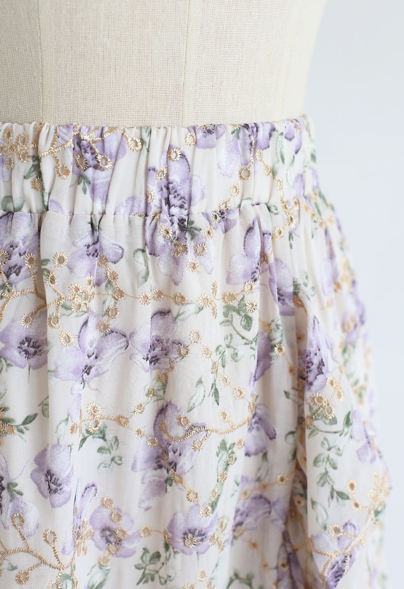 Falda de gasa bordada con ojales y volantes con estampado floral en lila