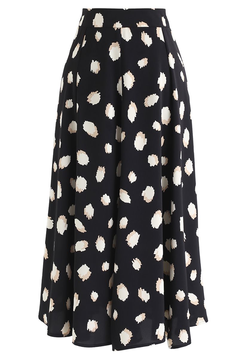 Falda midi bicolor con estampado de lunares irregulares en negro