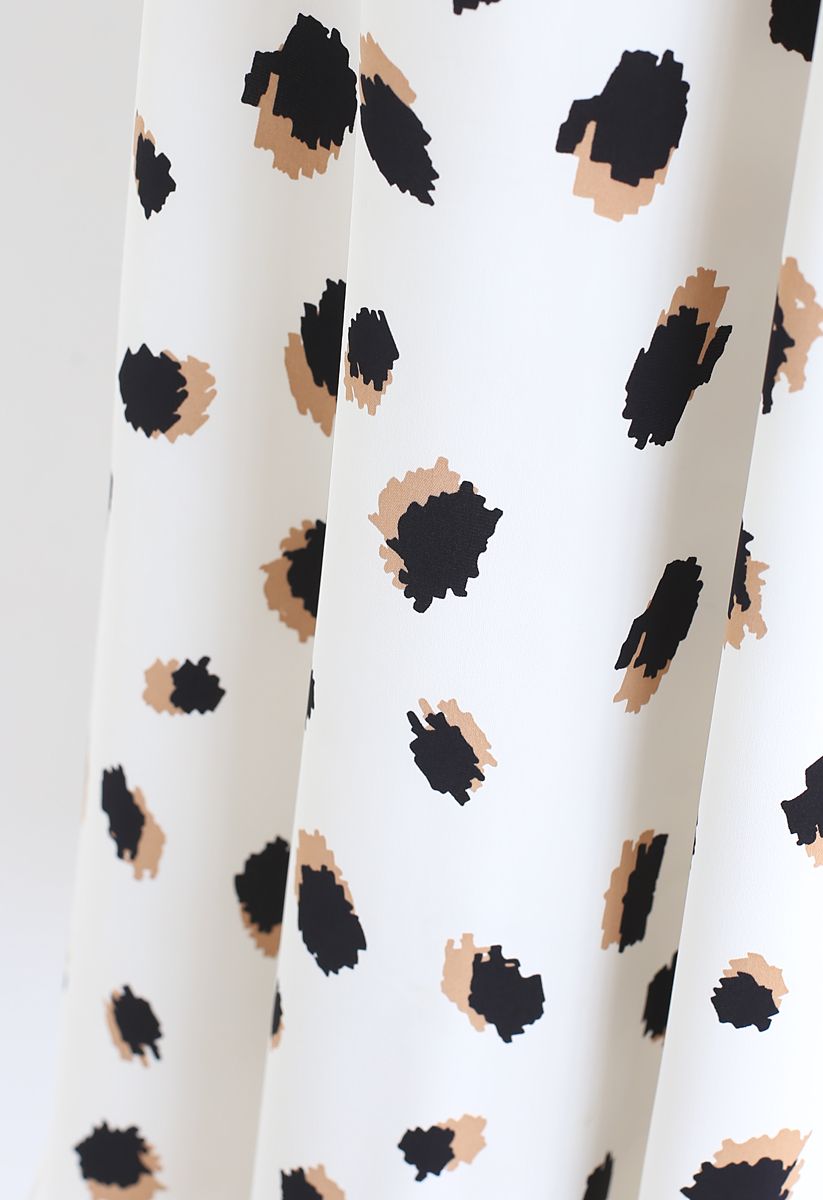 Falda midi bicolor con estampado de lunares irregulares en blanco