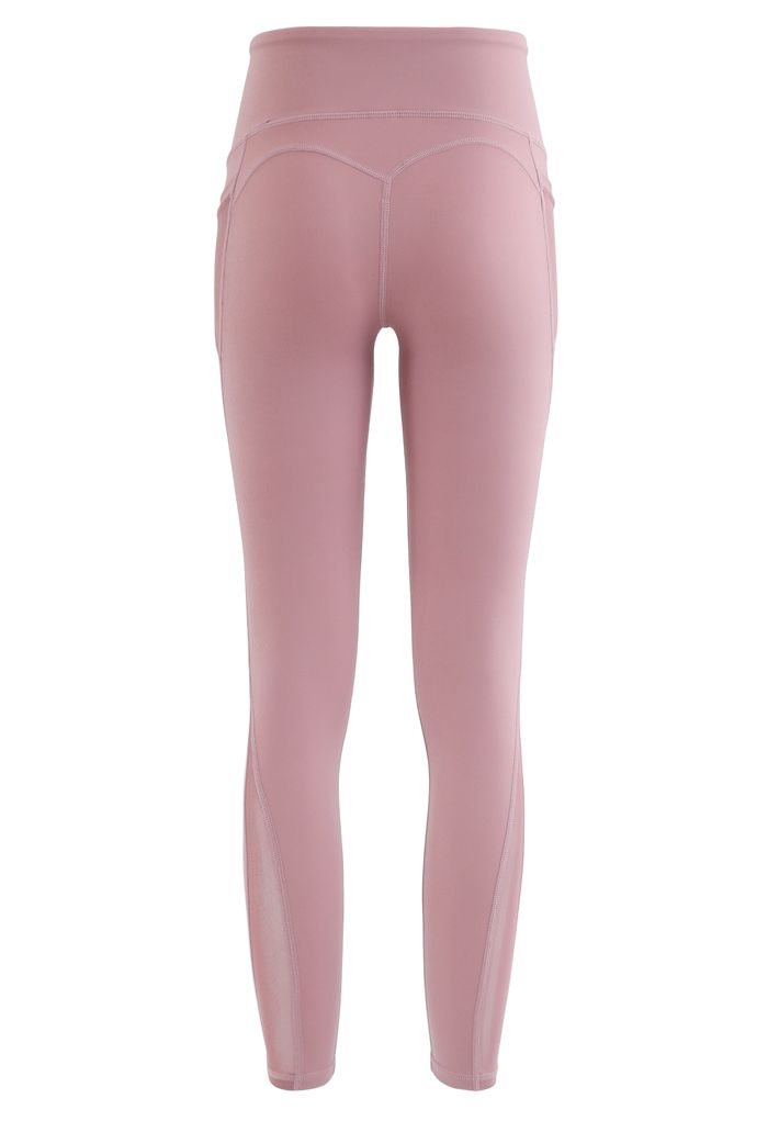Leggings tobilleros con detalle de costuras de tiro alto y bolsillos de malla en rosa polvoriento