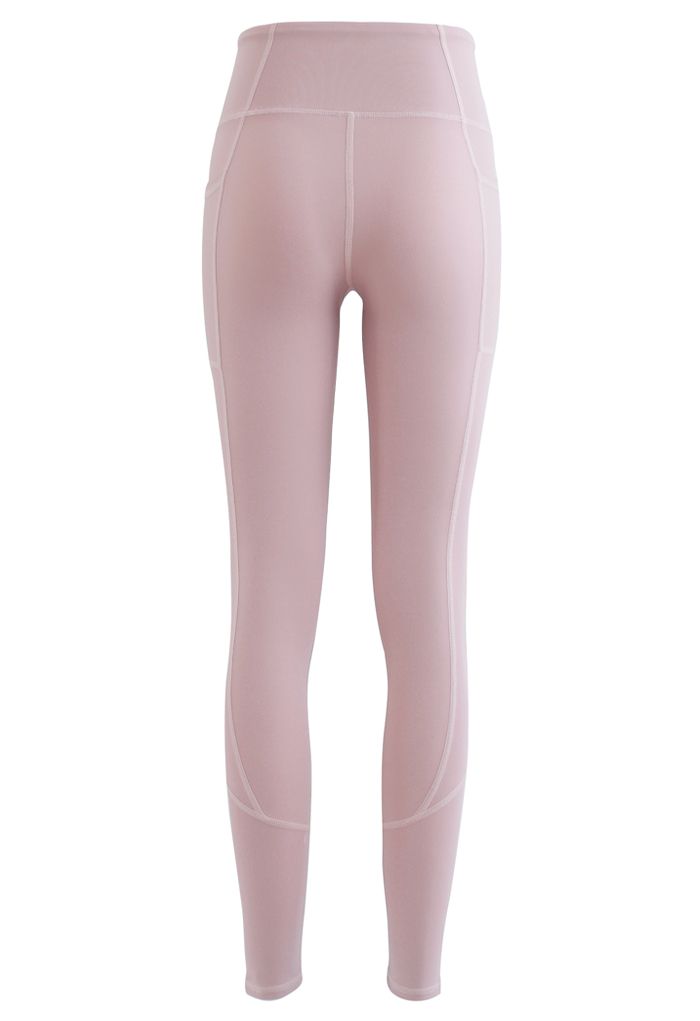 Leggings tobilleros con detalle de costura y bolsillos laterales en rosa nude