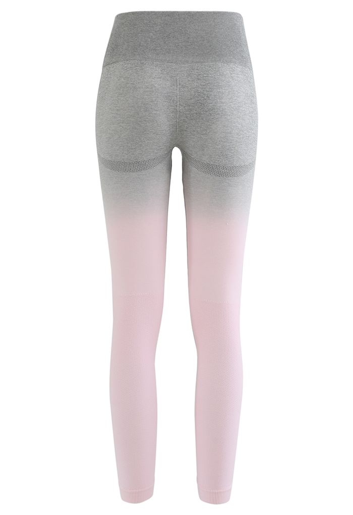 Conjunto de sujetador deportivo de impacto medio degradado y leggings tobilleros de tiro alto en rosa claro