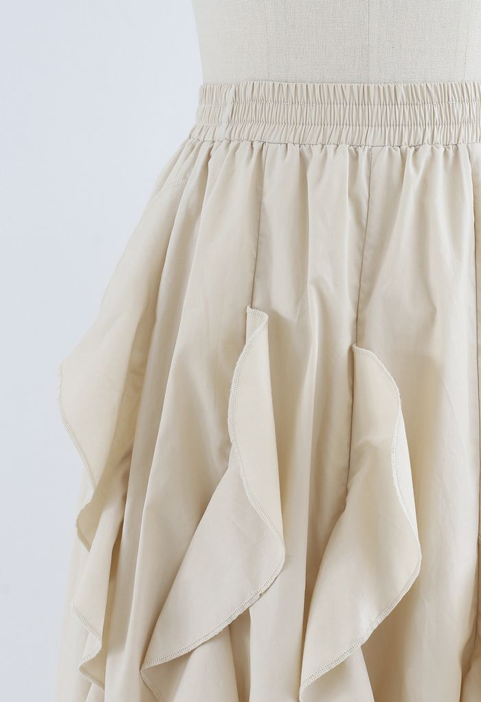 Falda midi evasé de algodón con ribete de volantes en color crema