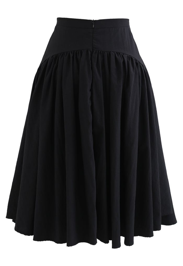 Falda midi asimétrica con dobladillo acampanado en negro